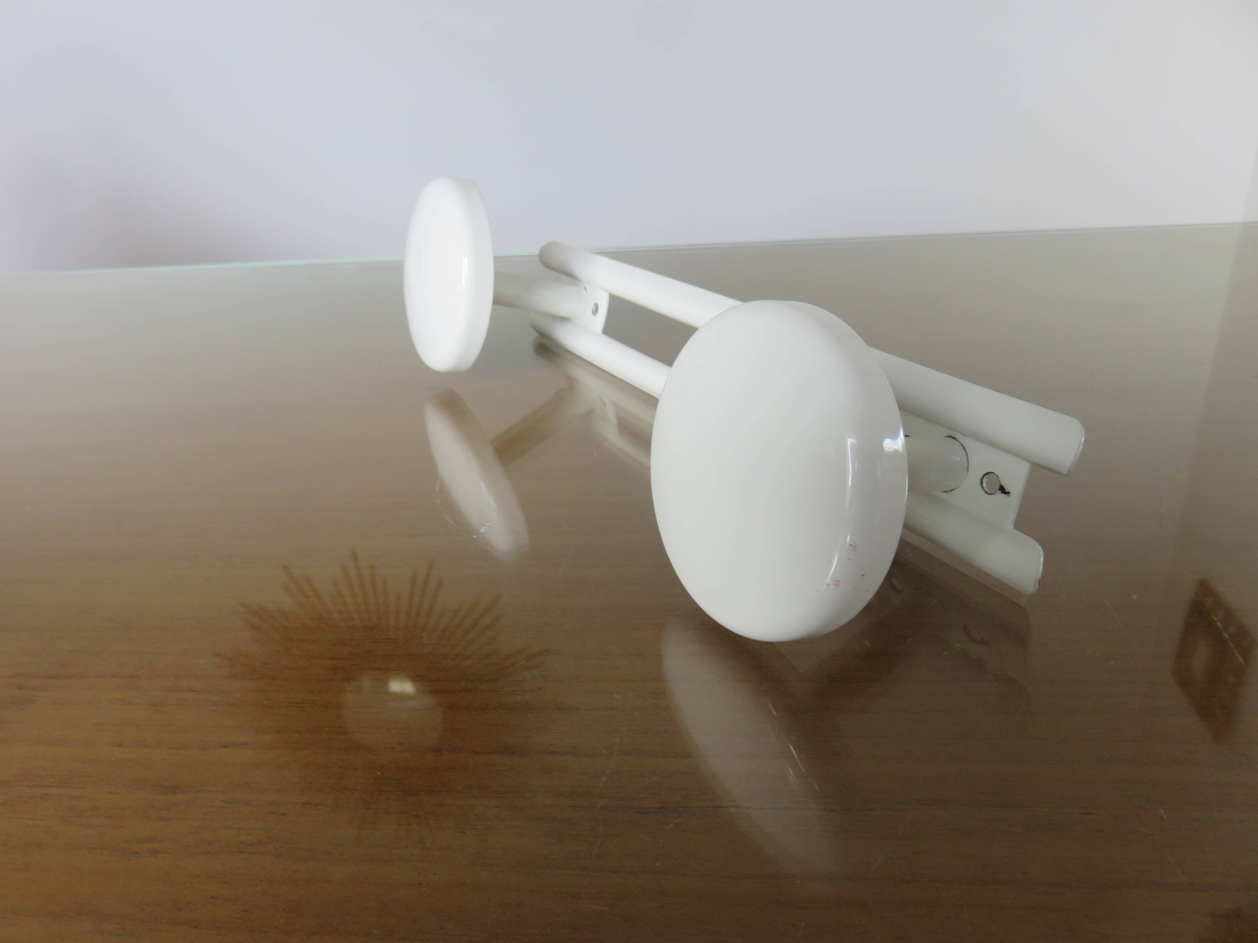 Wall coat rack in white lacquered metal with 2 hooks, 1970.