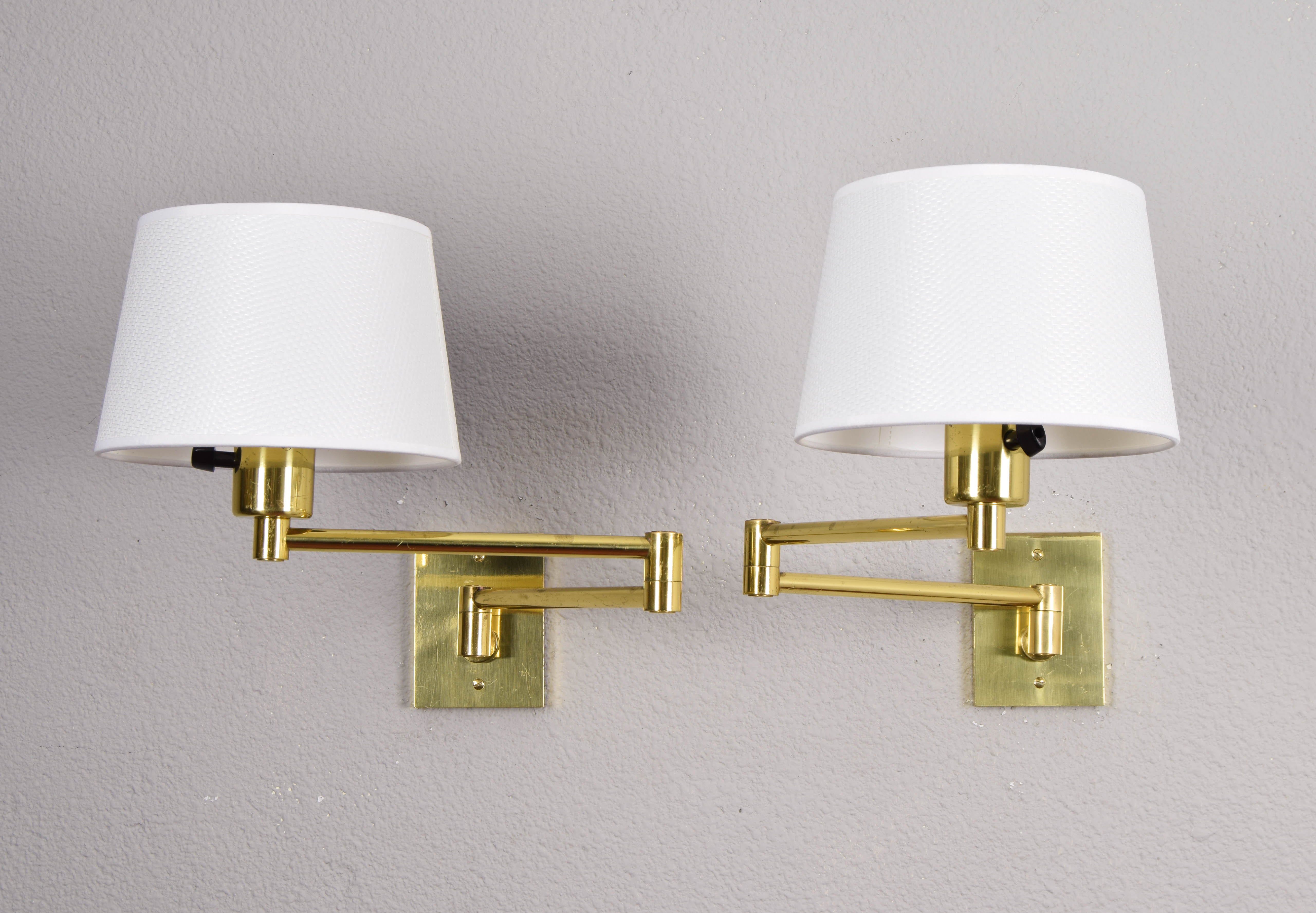 Two Mid-Century Modern Swing Arm Brass Sconces by George W Hansen for Metalarte