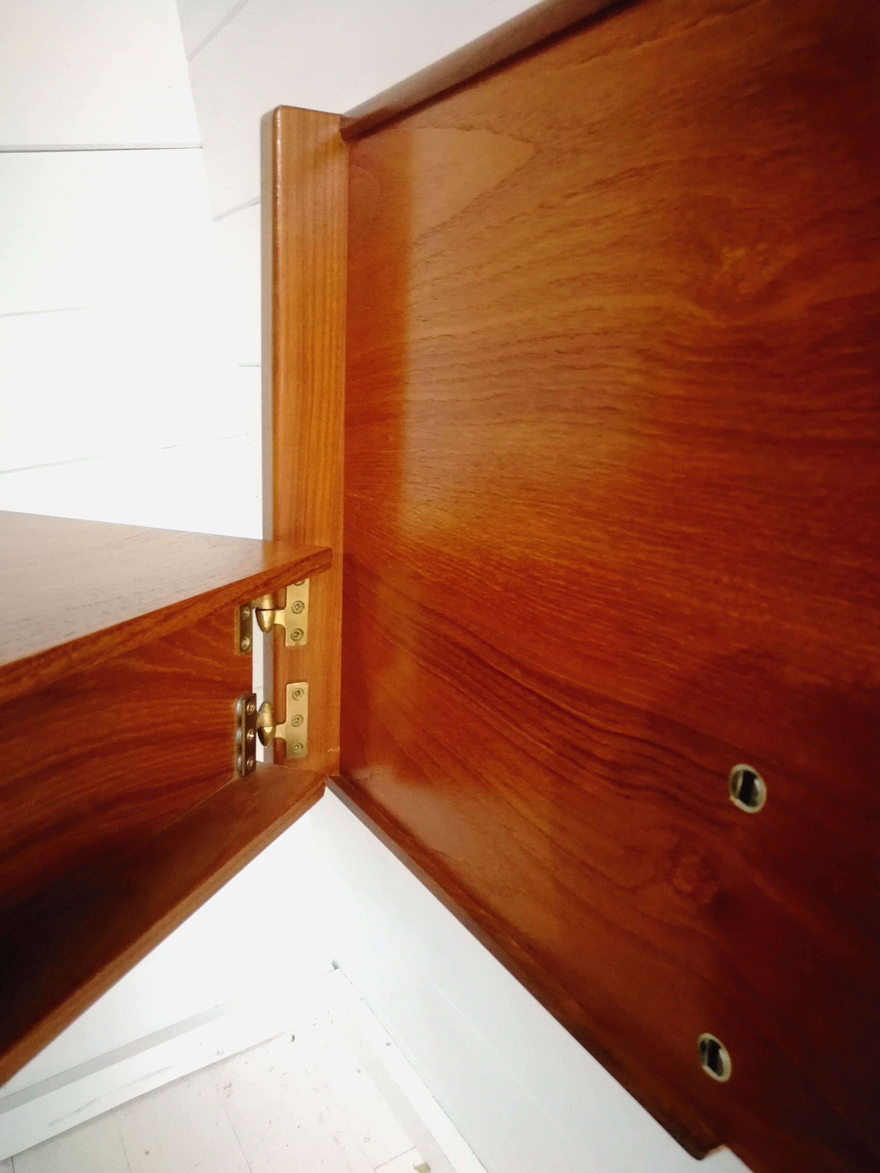 Mid century 1970s retro teak headboard with two hinged bedsides, upholstered in black by 'slumberlan