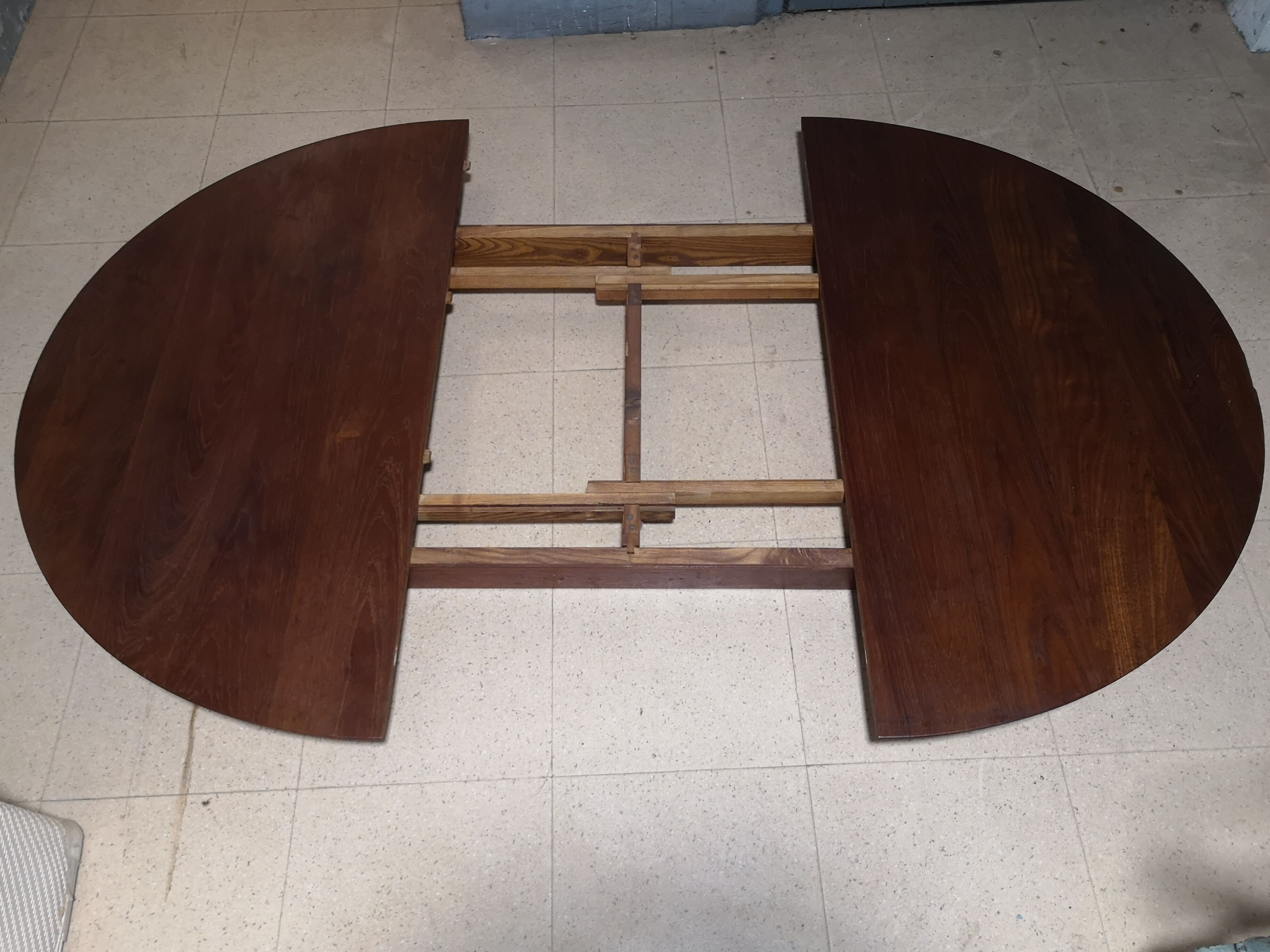 Scandinavian extendable round dining table in teak