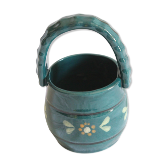 Old ceramic pot with flowers