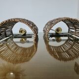 Pair of "tiki ona" wall lights in branches and rattan, 1980