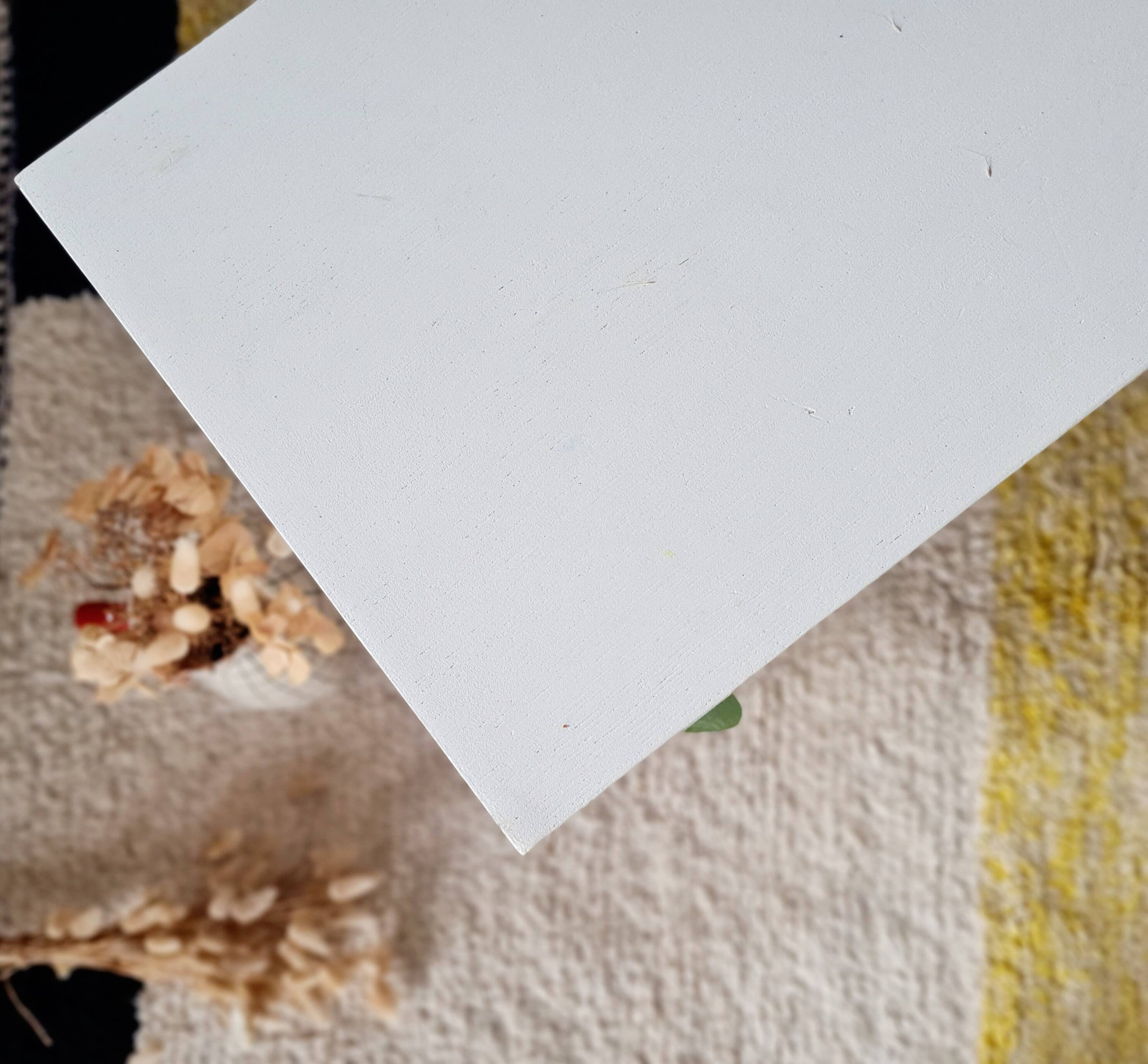 Vintage bedside table with tapered legs - white