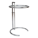 Adjustable height side table in the style of Eileen Gray.