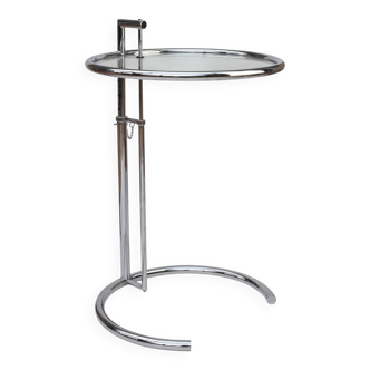 Adjustable height side table in the style of Eileen Gray.