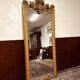 Antique English golden barock mirror mirror with large ornament