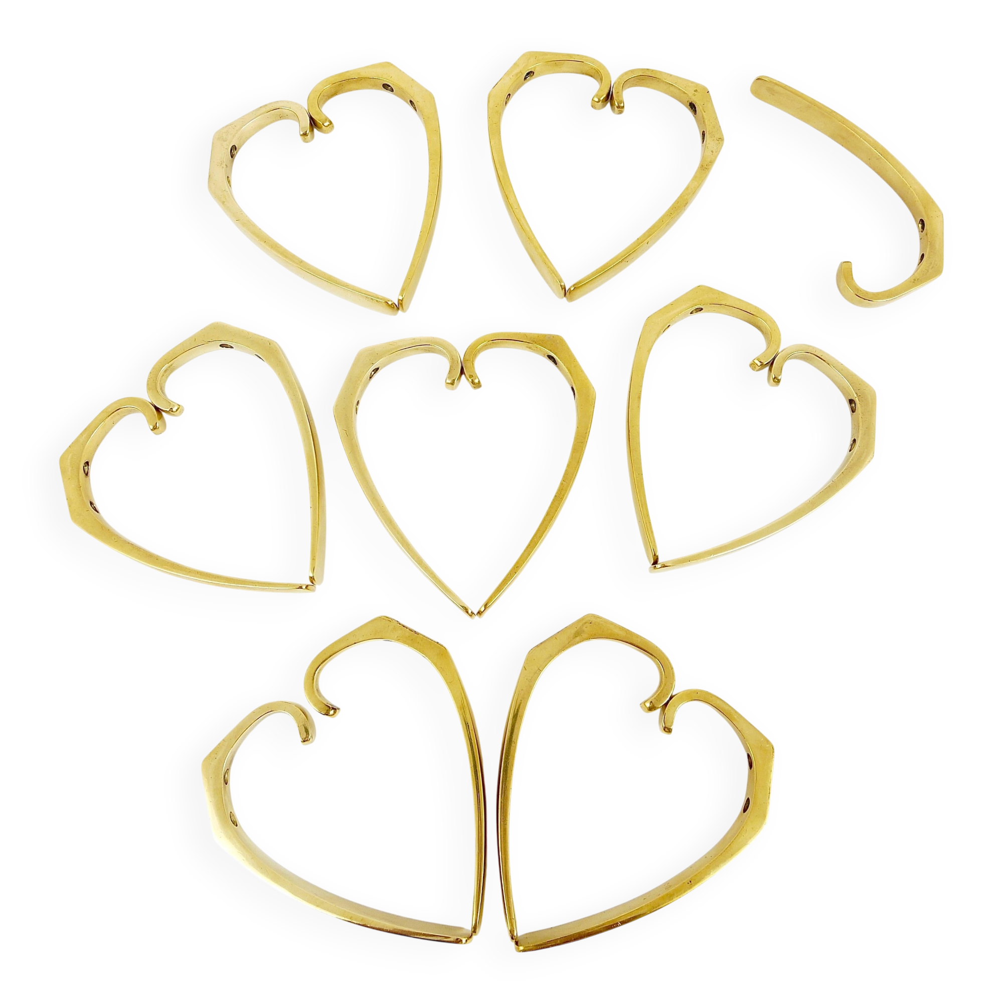 9 vintage brass wall hooks by Herta Baller, Vienna, Austria, 1950s.