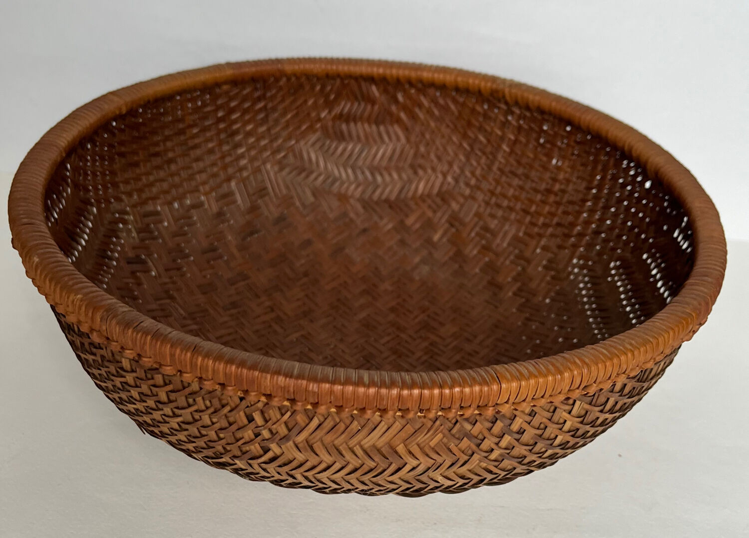 Woven straw basket