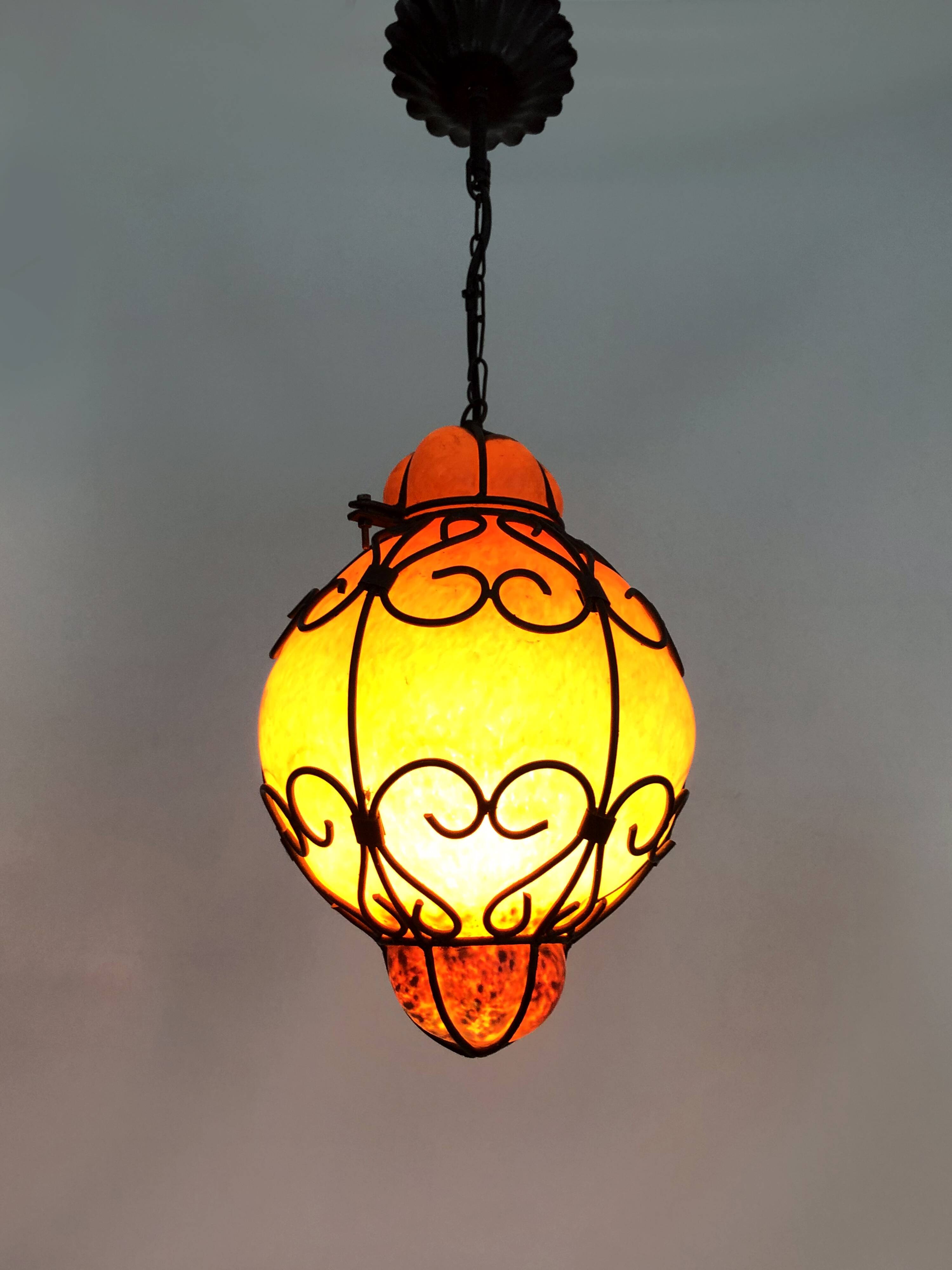 Venetian cage lantern suspension in orange and blue glass paste. Venetian lantern