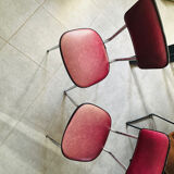 Pair of raspberry-colored chairs from the 60s/70s with metal legs
