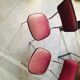 Pair of raspberry-colored chairs from the 60s/70s with metal legs
