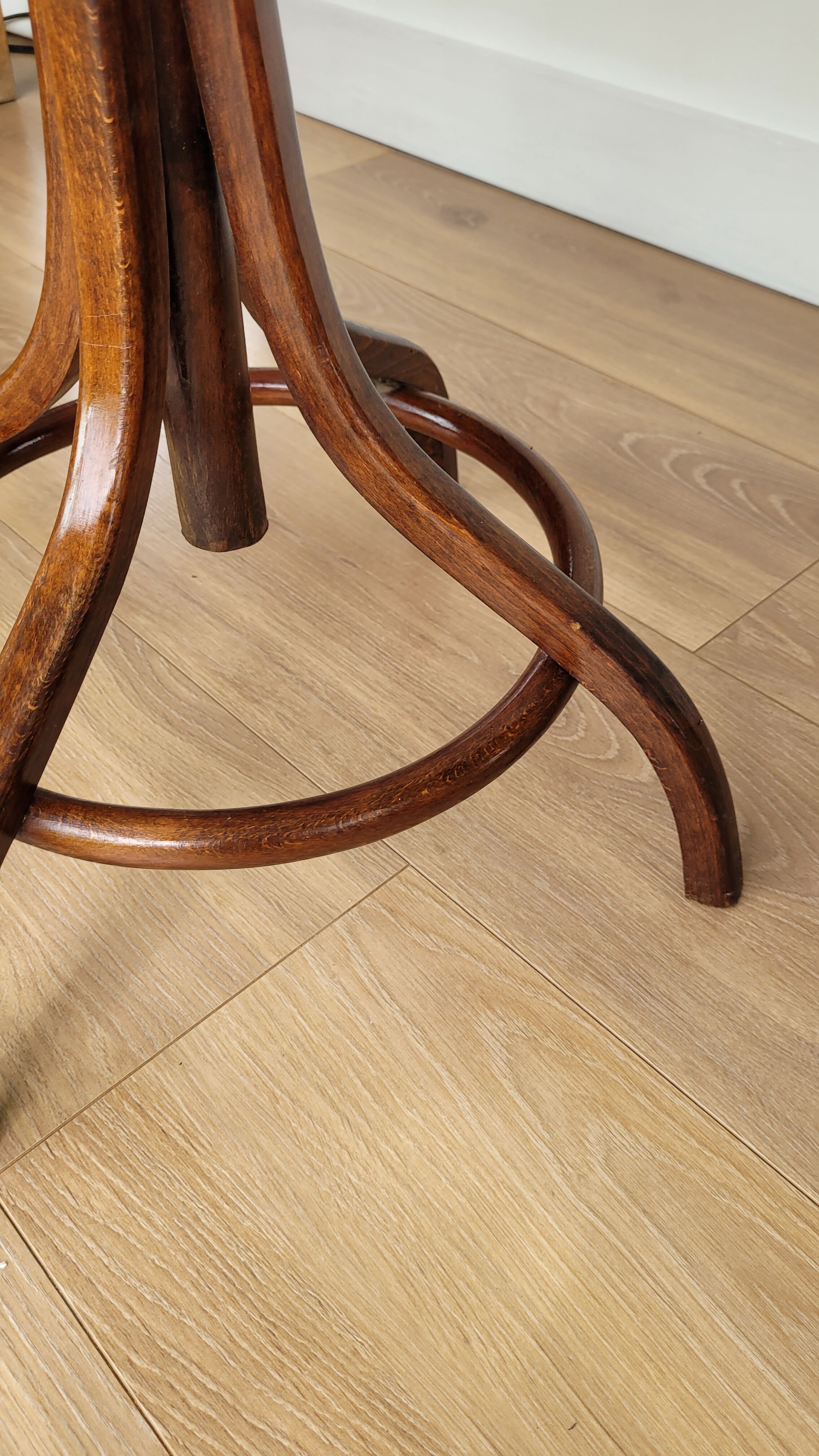 Wooden parrot coat rack on foot