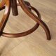 Wooden parrot coat rack on foot