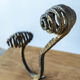 Set of six hammered Art Deco coat hooks