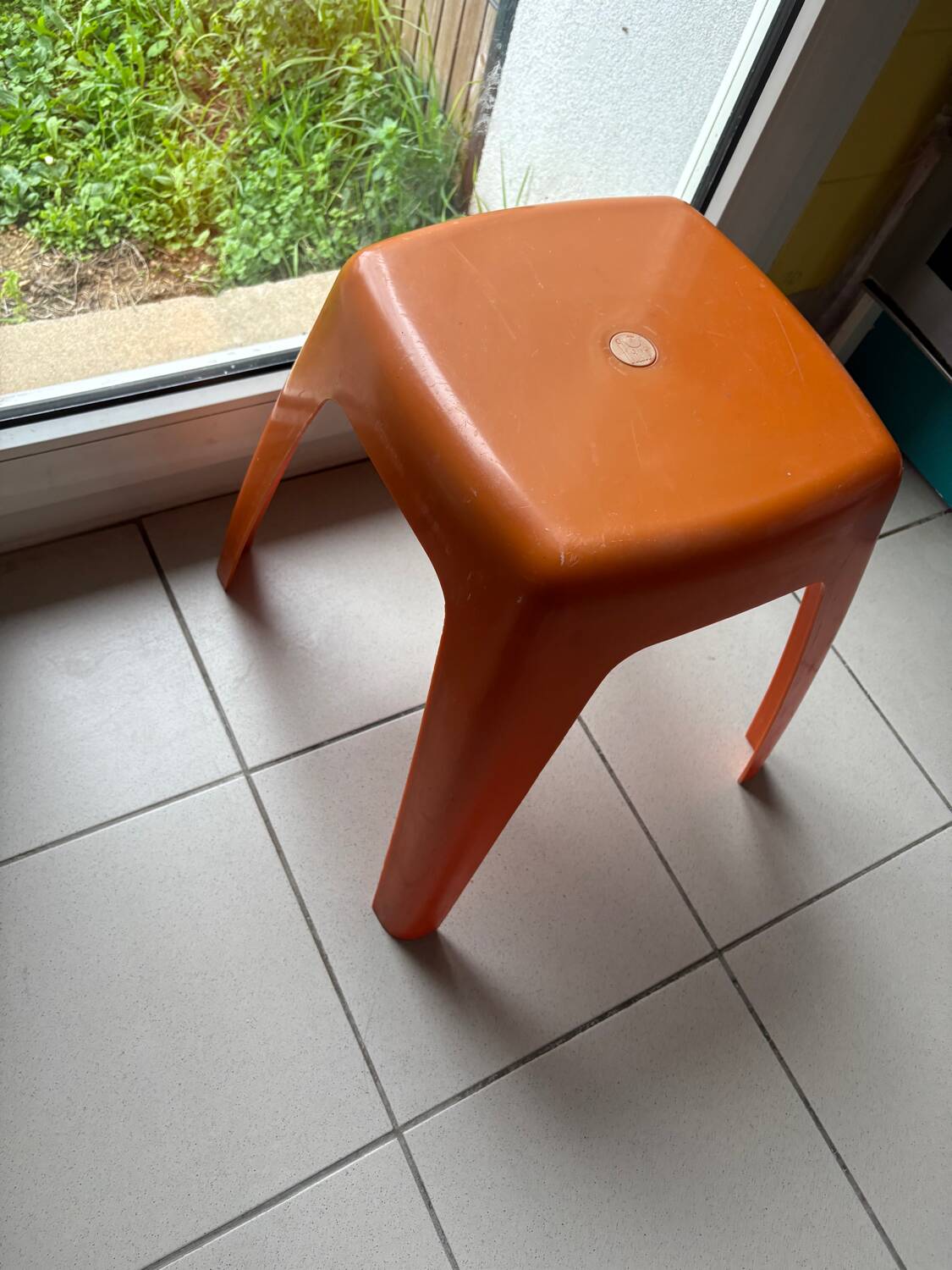 Vintage orange Flair stool from the 70s