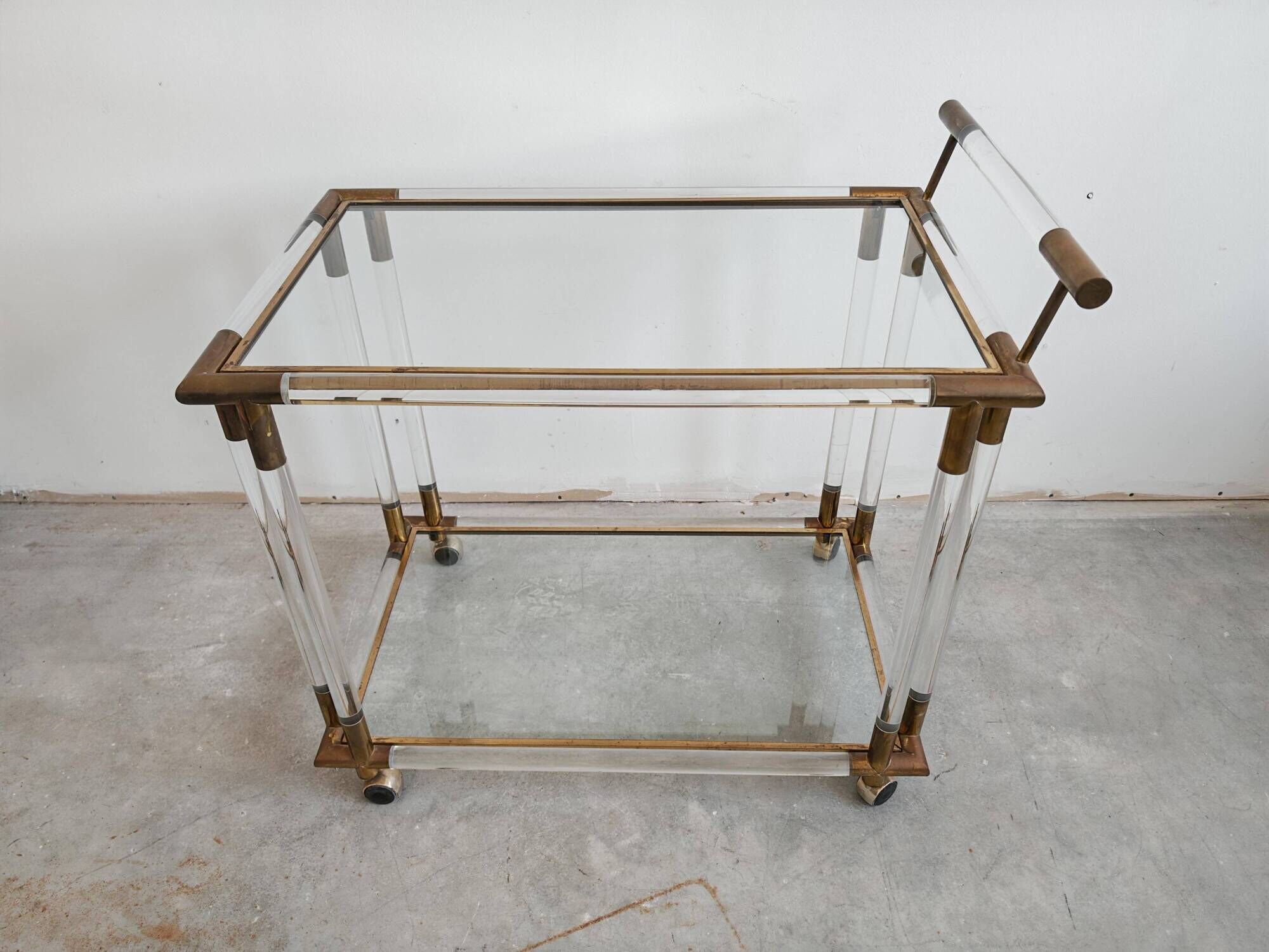 Modern mid-century bar cart in lucite, bronze, and glass, 1970s