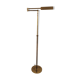 Articulated brass floor lamp