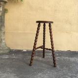 High tripod stool.