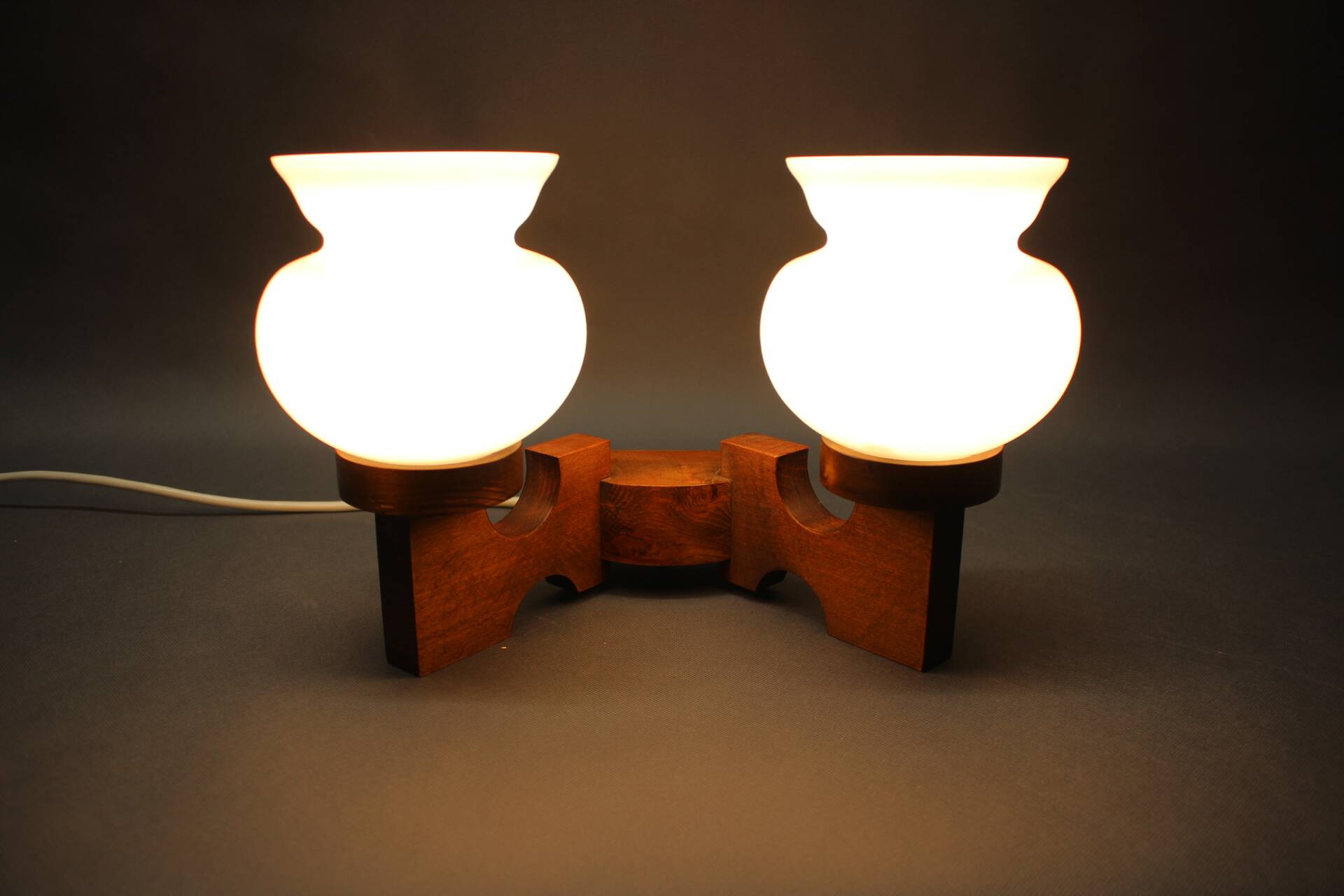 Czechoslovak wall lamp from the 1960s with Valasske Mezirici glass and a wooden base.