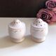 Vintage porcelain salt and pepper shaker duo
