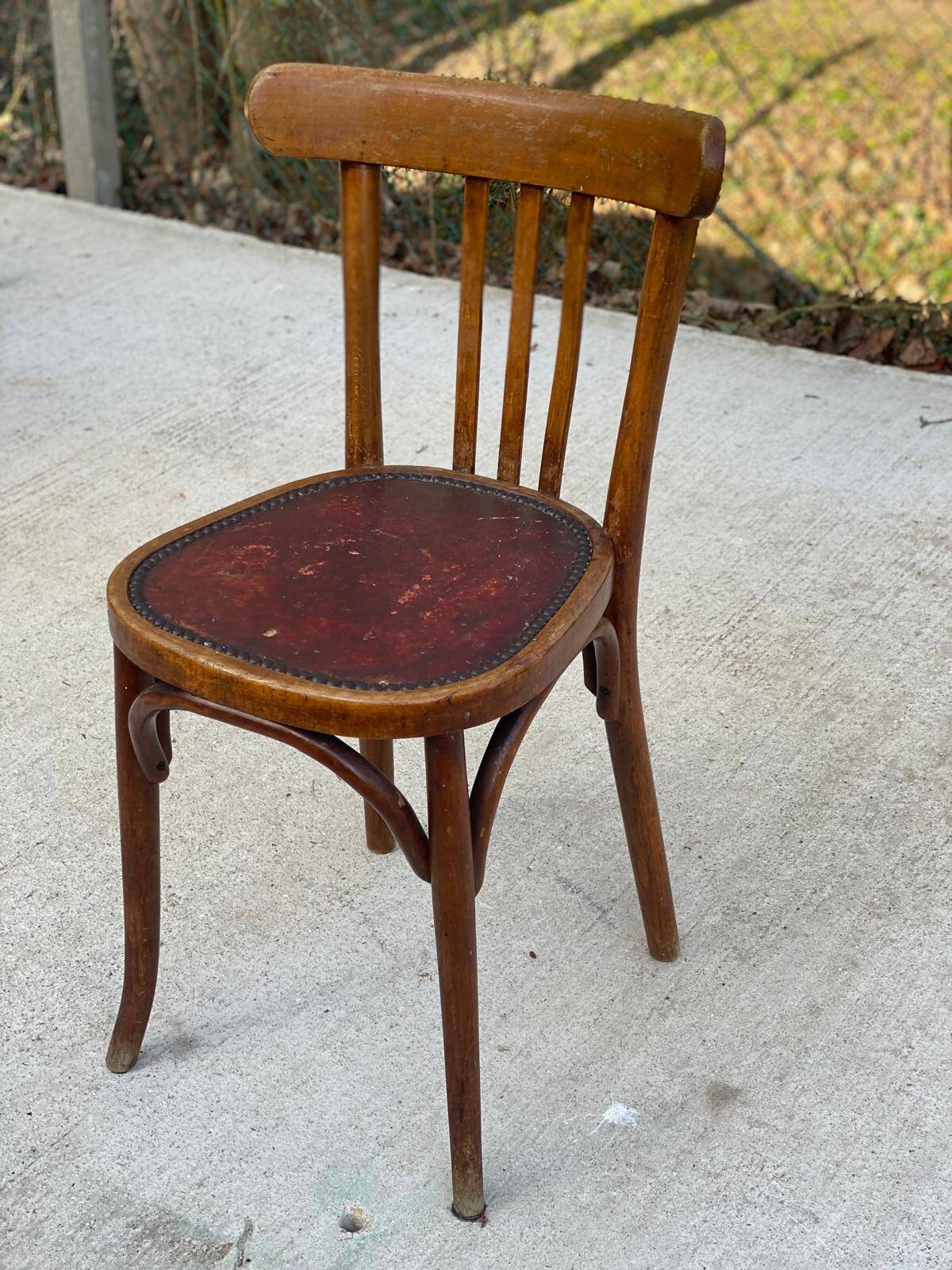 Bentwood bistro chair upholstered in burgundy leather