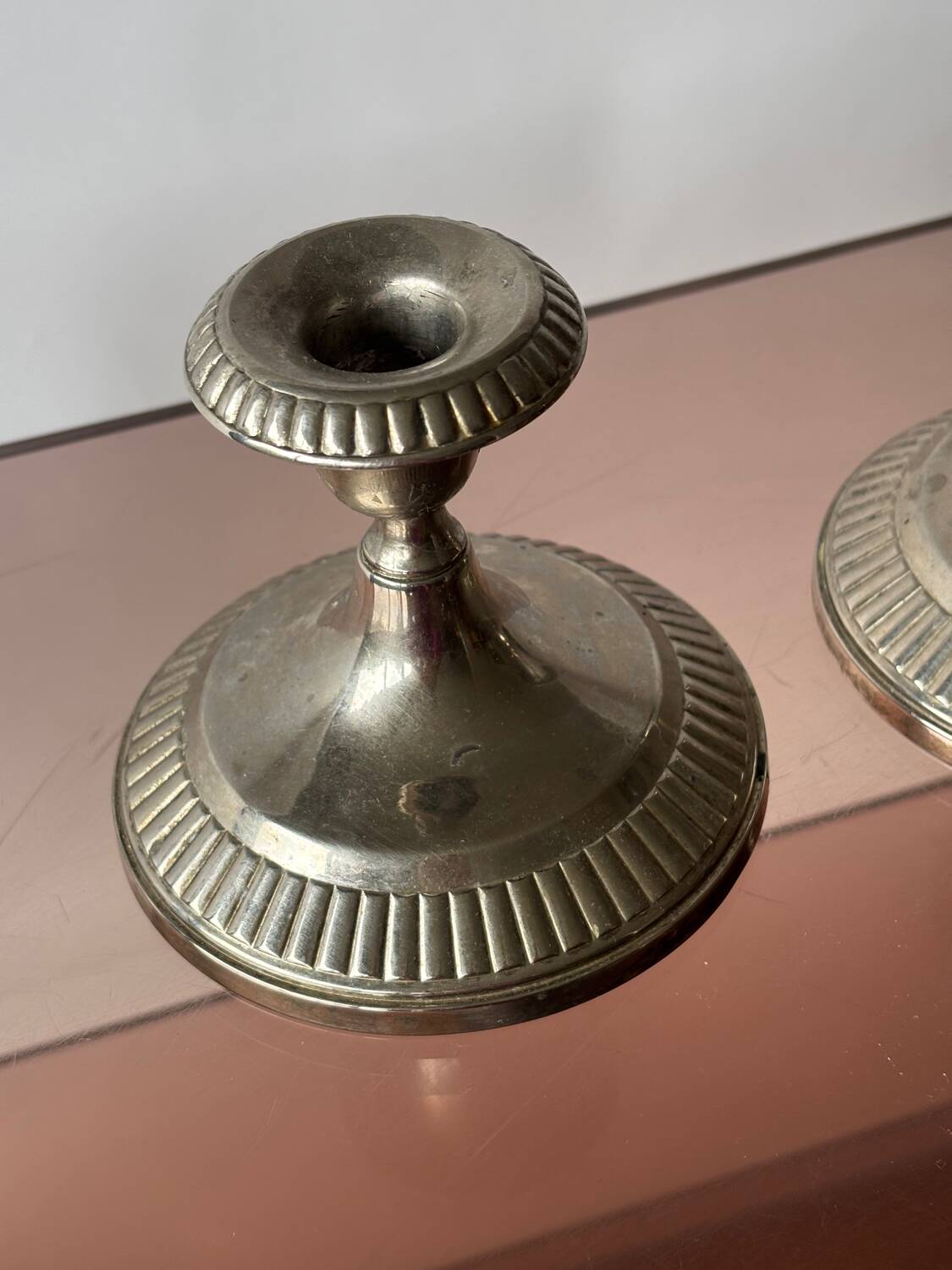 Antique silver-plated metal candlesticks