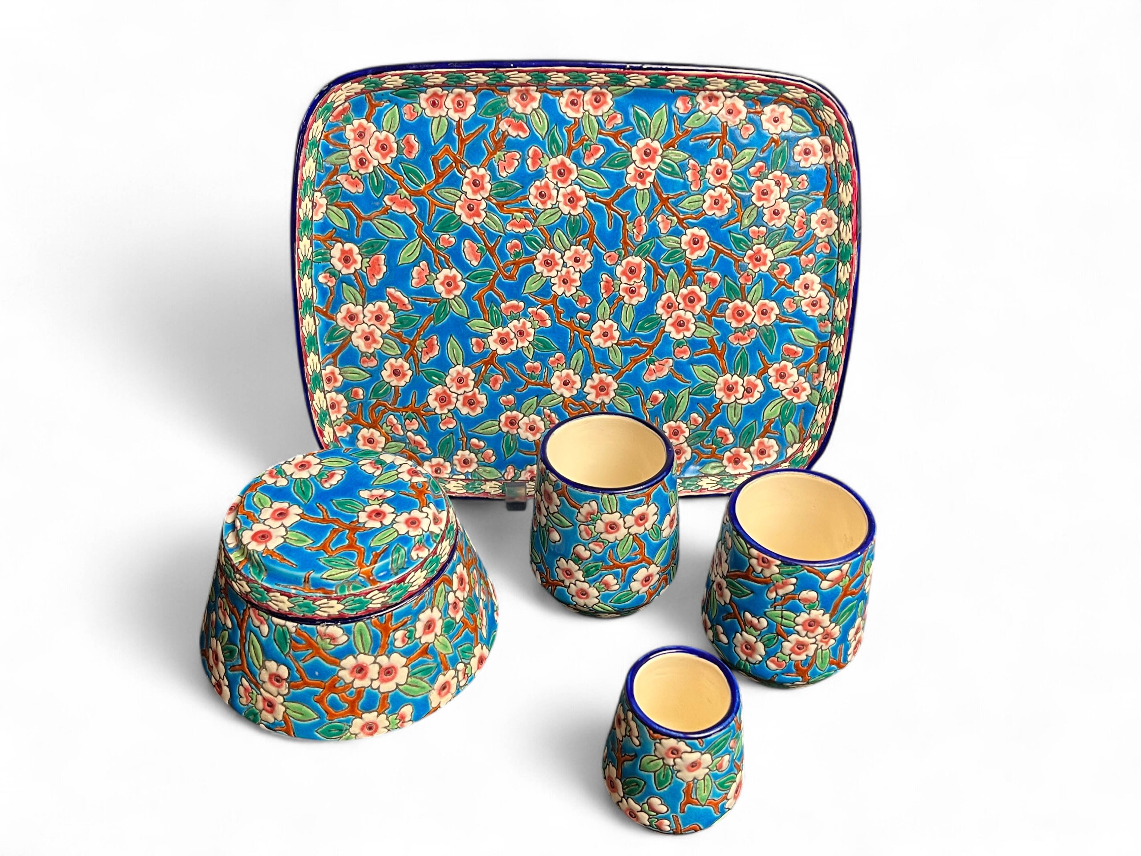 Longwy, cherry blossom glazed earthenware smoking set, early 20th century