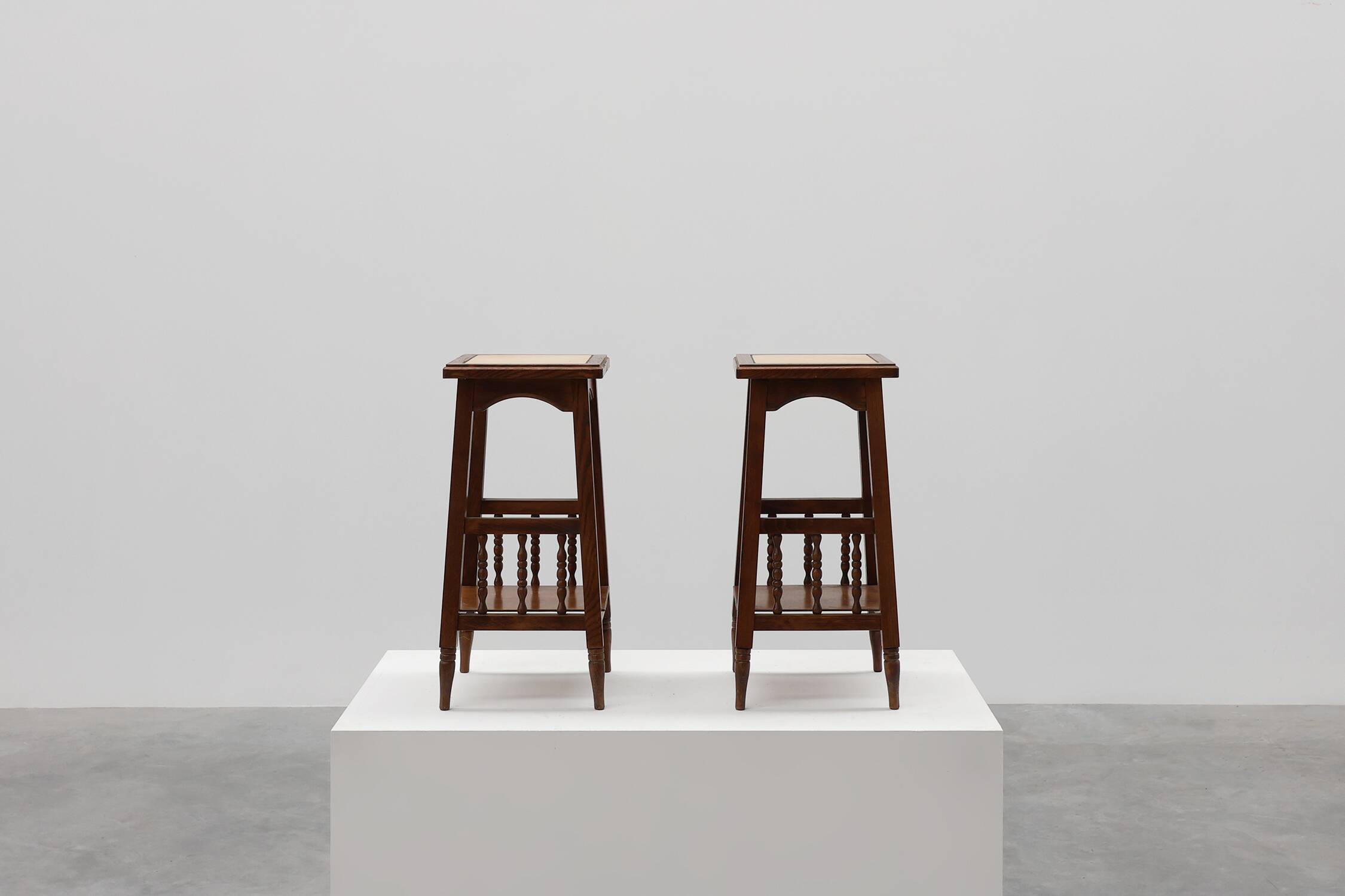 Pair of 20th century rustic wooden side tables with ceramic tile top