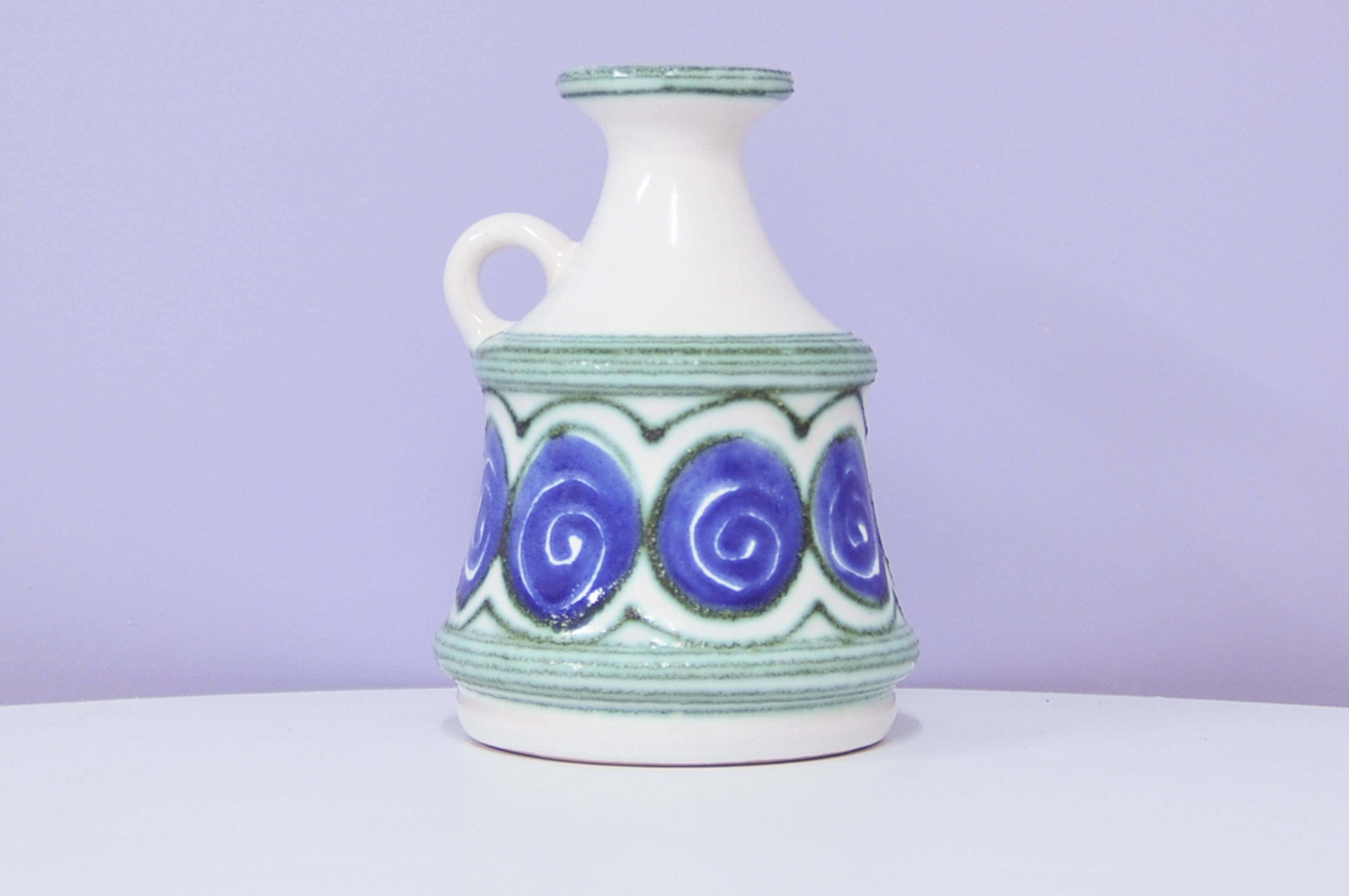 vintage white vase painted blue