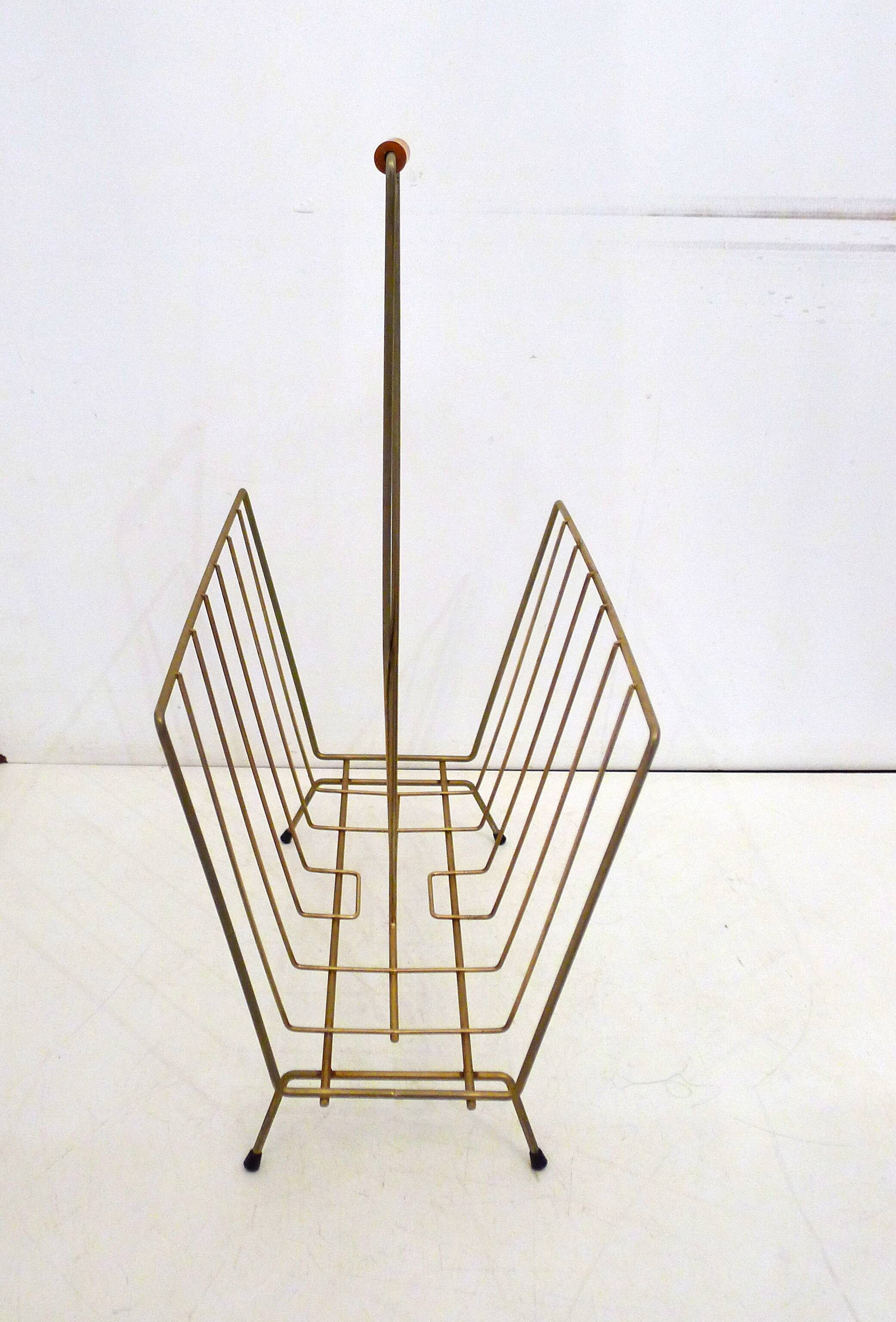 Mid-century openwork magazine rack, in gold metal & wooden handle.
