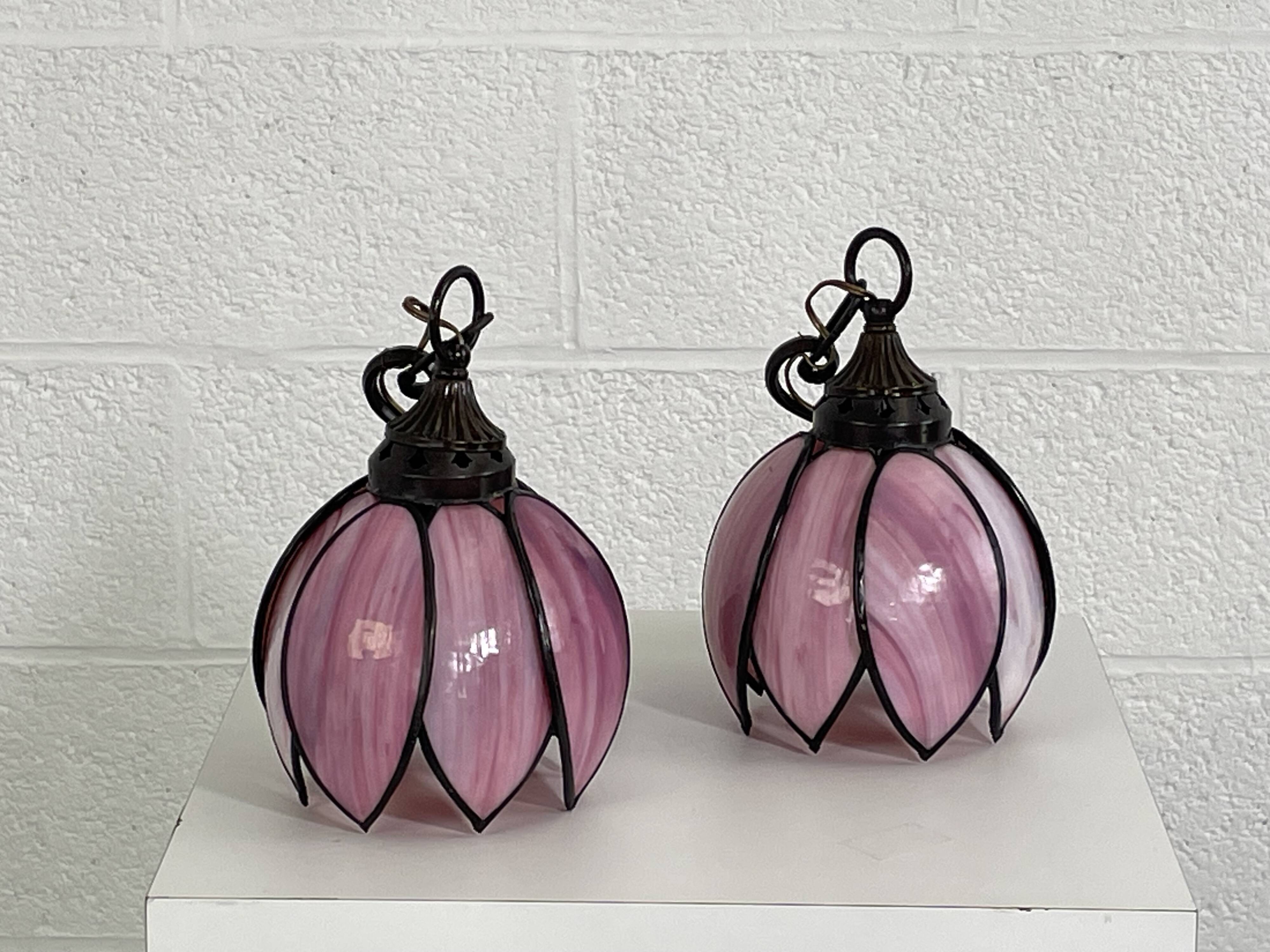 pair of iron wall lamps and Tiffany style glass legs