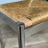 4 chrome and straw chairs