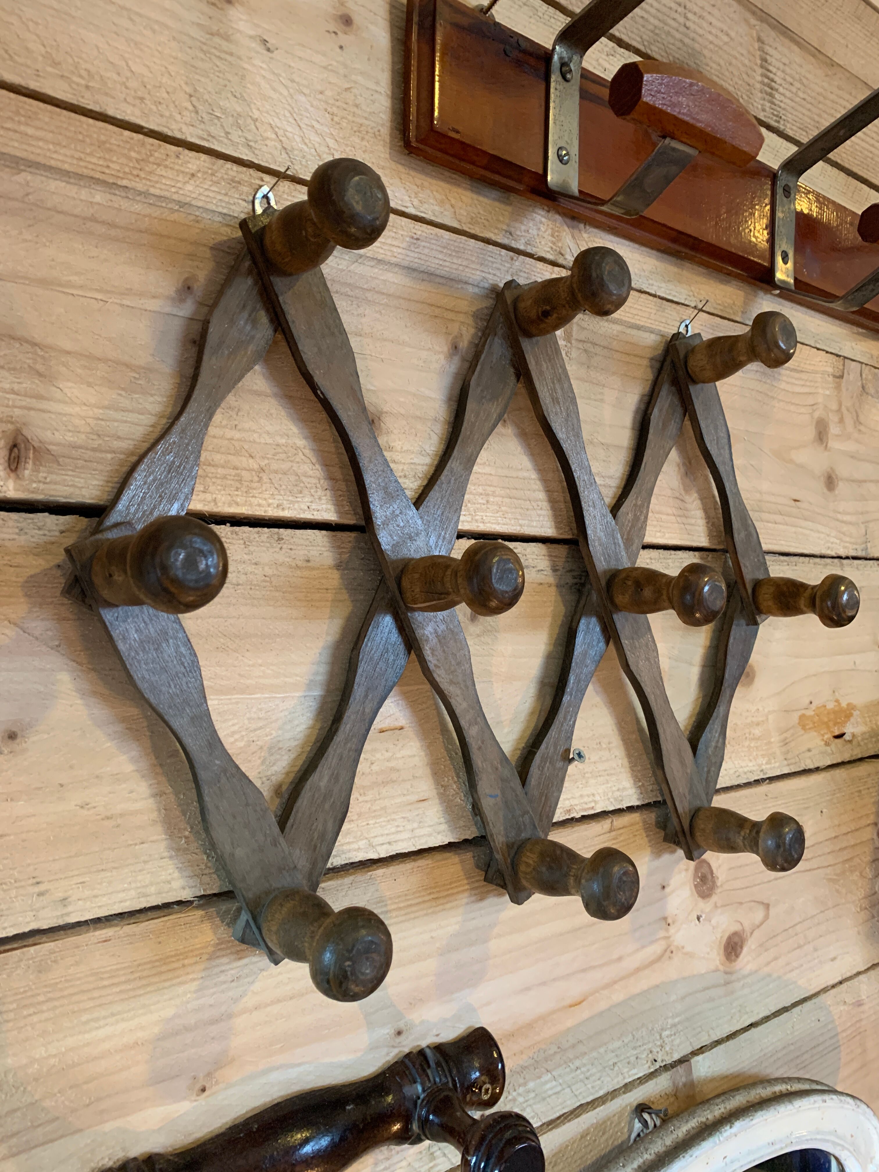 Accordion wall coat holder