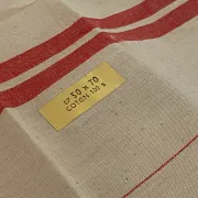 Three new multicoloured tea towels made of Cholet fabric, 100% cotton.