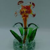 Cup has blown glass jewelry
