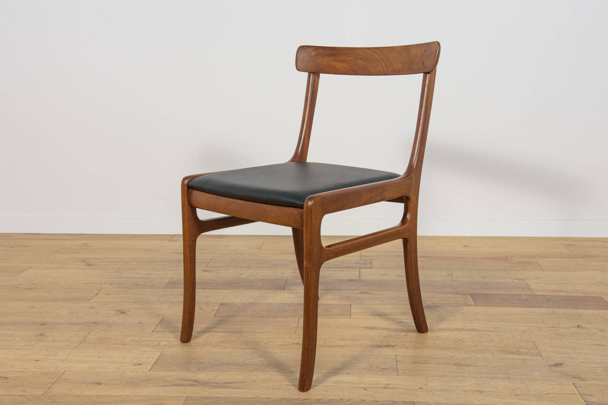 Danish Dining Chairs by Ole Wanscher for Poul Jeppesens Furniture Factory.
