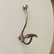 Antique steel wall-mounted coat rack