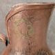 Antique hammered copper jug