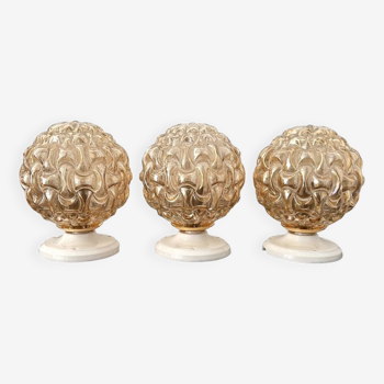 Trio of golden globe wall or ceiling lights