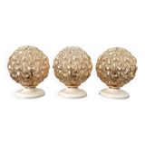 Trio of golden globe wall or ceiling lights