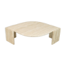 Curved coffee table, travertine, France, circa 1970.