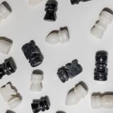 Vintage black-and-white marble chessboard with matching marble pieces, Italian 1960s design, sculptural centerpiece