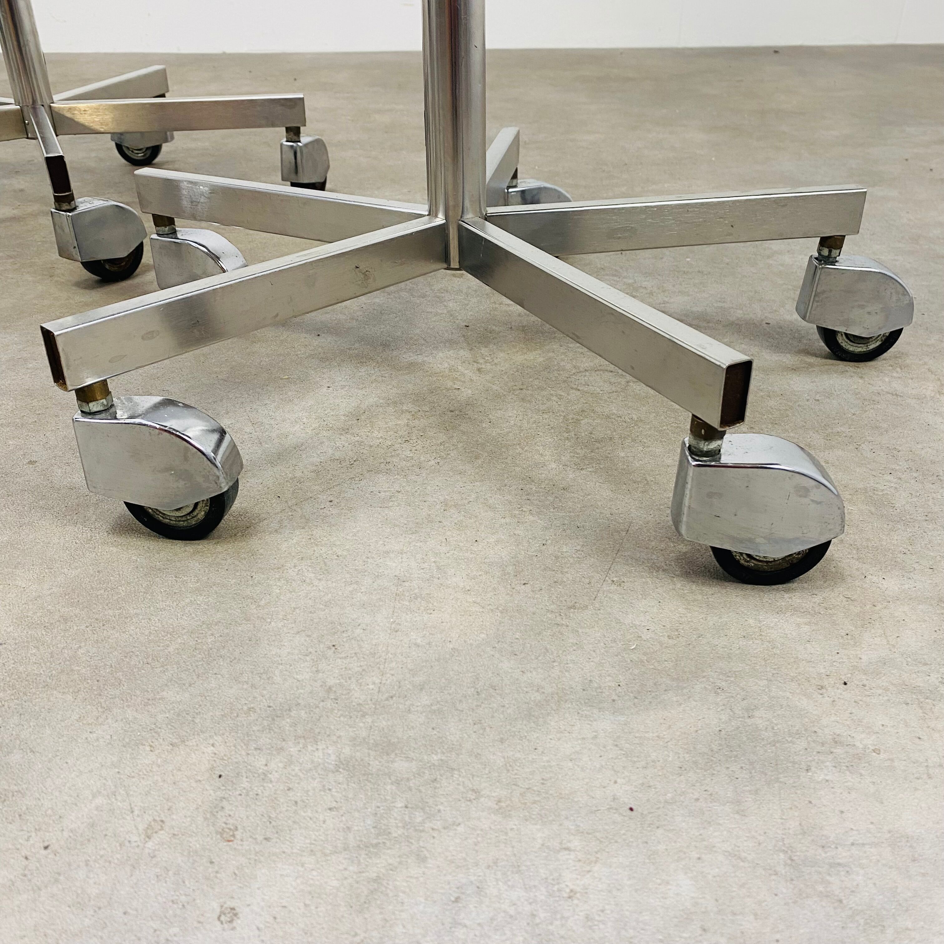 3 adjustable industrial stools with aluminum wheels