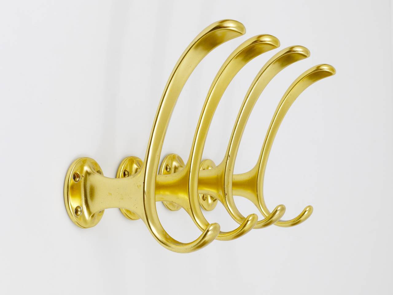 Set of four mid-century golden wall hooks, Austria, Vienna, 1950s.