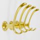 Set of four mid-century golden wall hooks, Austria, Vienna, 1950s.