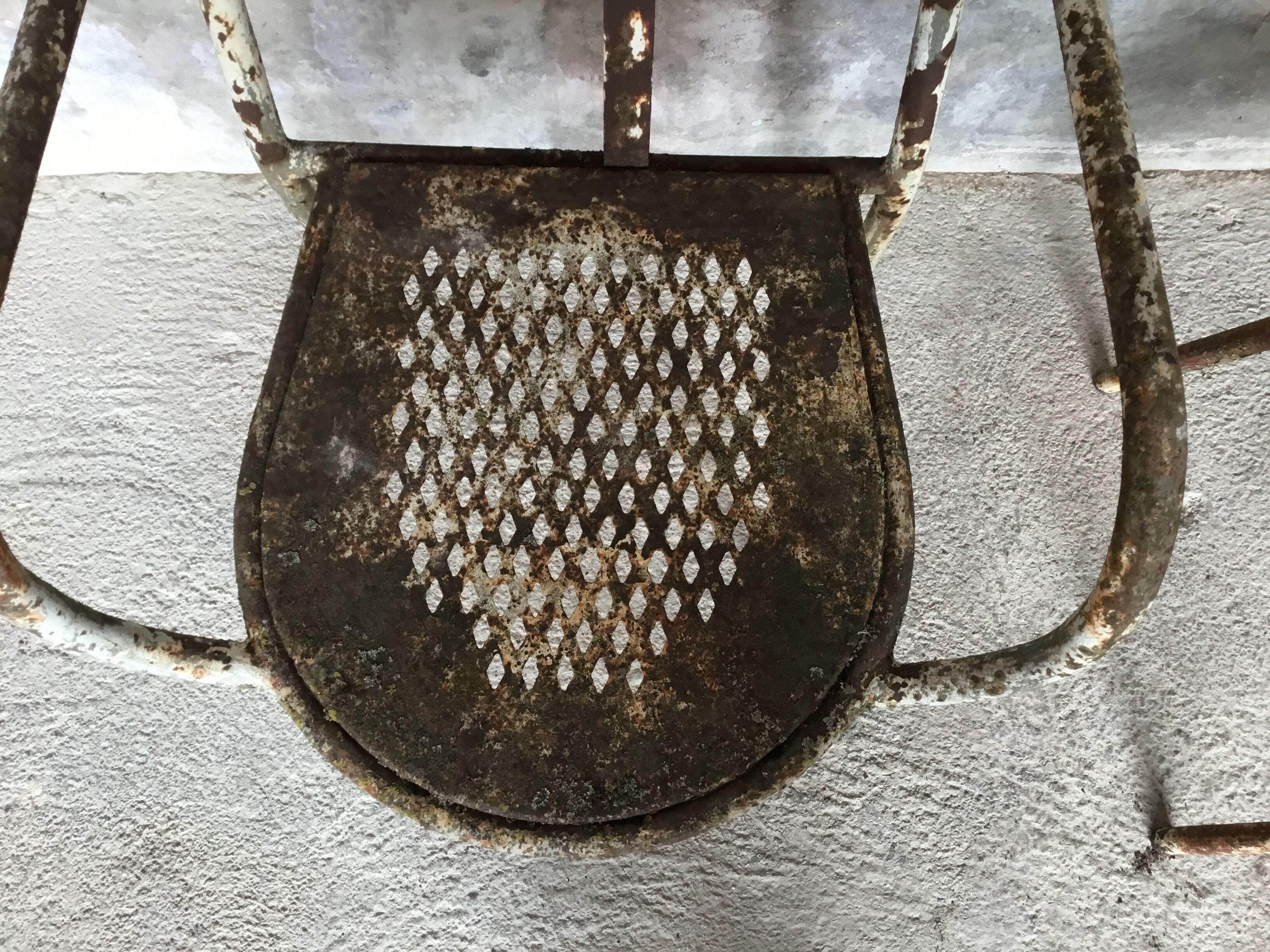 Pair of metal armchairs