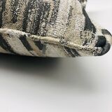 Coussin carré à bords passepoilés