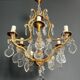 Louis XV style bronze chandelier with crystals and 6 lights