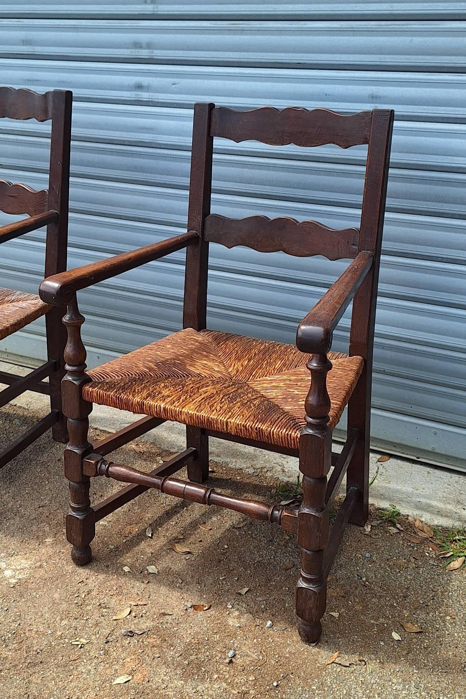 Pair of wooden and straw farmhouse armchairs