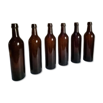 6 bouteilles de vin bordelaises anciennes en verre rubis-brun, France XIXe siècle